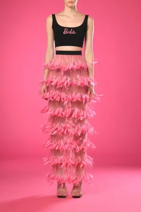 Black top with pink feathers skirt