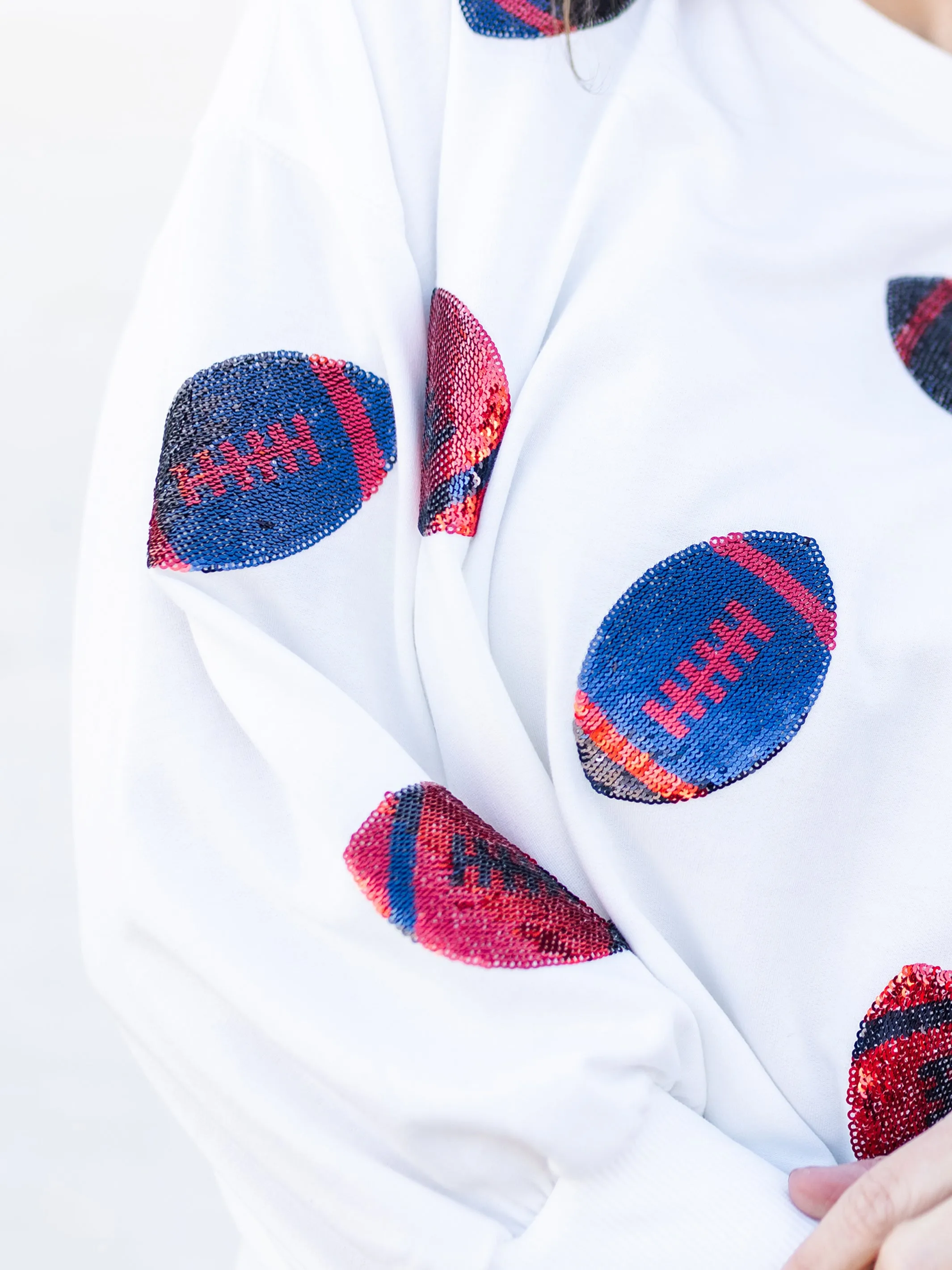 Millie Sweatshirt | Footballs Red   Blue