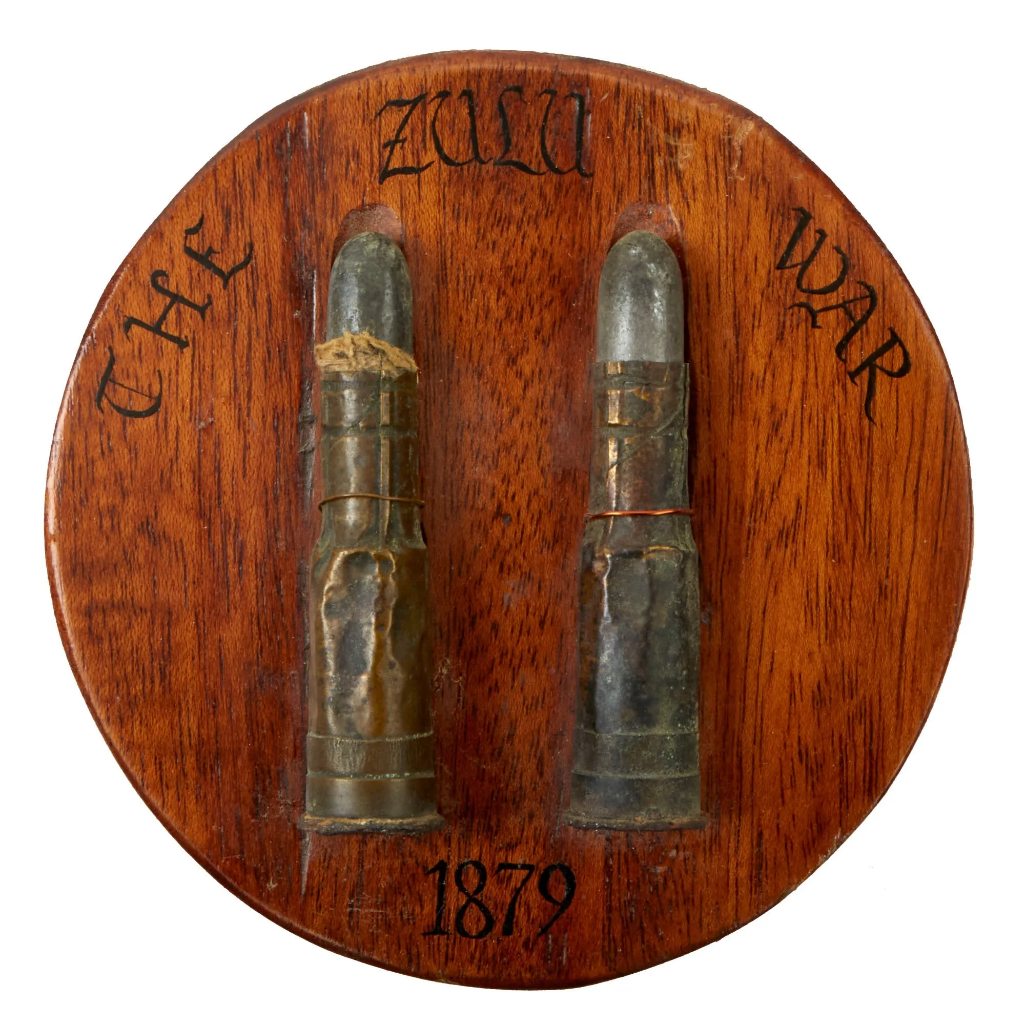 Original British Anglo-Zulu War Mounted Inert Coiled Brass .577/450 Martini–Henry Souvenir Rounds on Plaque Marked “The Zulu War 1879”